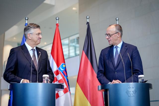 10 December 2025, Berlin: German Chancellor Friedrich Merz (R) holds a joint press conference with the Prime Minister of the Republic of Croatia, Andrej Plenkovic, at the Federal Chancellery in Berlin. Photo: Kay Nietfeld/dpa