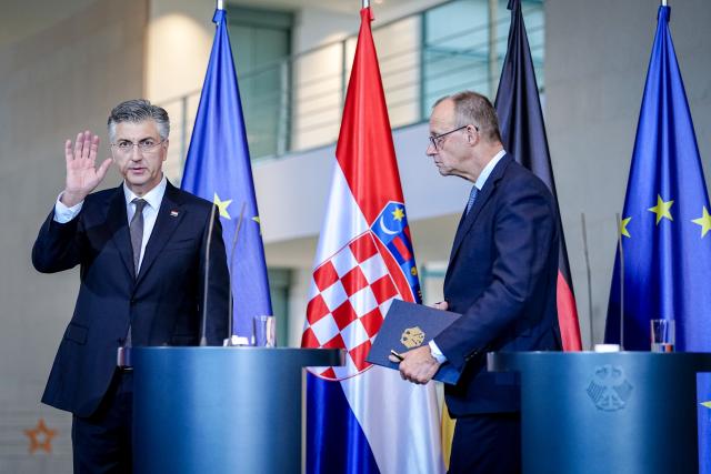 10 December 2025, Berlin: German Chancellor Friedrich Merz (R) holds a joint press conference with the Prime Minister of the Republic of Croatia, Andrej Plenkovic, at the Federal Chancellery in Berlin. Photo: Kay Nietfeld/dpa