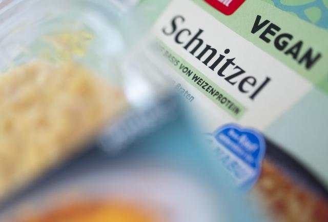 FILED - 02 October 2025, Stuttgart: A pack of vegan schnitzel based on wheat protein stands on a kitchen table. Photo: Marijan Murat/dpa
