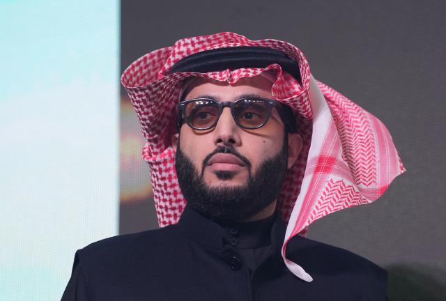 FILED - 09 December 2024, Hamburg: Chairman of the Saudi Entertainment Authority Turki al-Sheikh stands in the ballroom during the Boxing Legends Gala Night at the Grand Elysee Hotel. Photo: Marcus Brandt/dpa