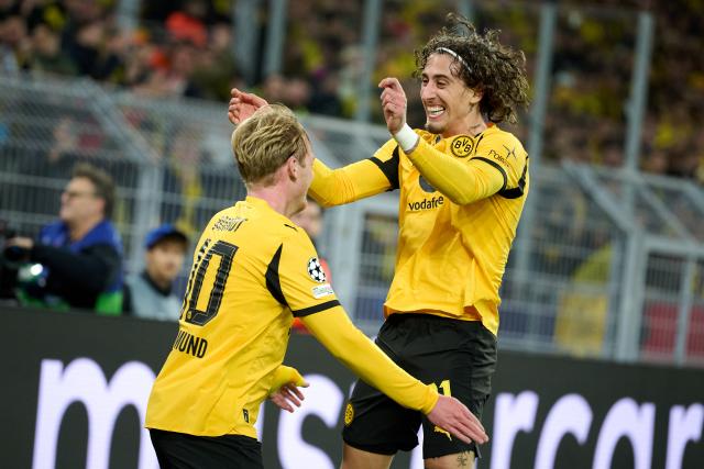 10 December 2025, North Rhine-Westphalia, Dortmund: Borussia Dortmund's Julian Brandt (L) celebrates scoring his side's first goal with teammate Fabio Silva during the UEFA Champions League soccer match between Borussia Dortmund and FK Bodoe/Glimt at Signal Iduna Park. Photo: Bernd Thissen/dpa
