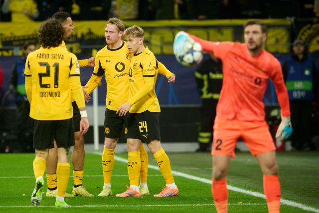10 December 2025, North Rhine-Westphalia, Dortmund: Borussia Dortmund's Julian Brandt (C) celebrates scoring his side's second goal with teammates during the UEFA Champions League soccer match between Borussia Dortmund and FK Bodoe/Glimt at Signal Iduna Park. Photo: Bernd Thissen/dpa