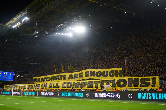 10 December 2025, North Rhine-Westphalia, Dortmund: Borussia Dortmund fans show banners in the stands during the UEFA Champions League soccer match between Borussia Dortmund and FK Bodoe/Glimt at Signal Iduna Park. Photo: Bernd Thissen/dpa