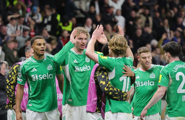 10 December 2025, North Rhine-Westphalia, Leverkusen: Newcastle United players celebrate their side's second goal during the UEFA Champions League soccer match between Bayer Leverkusen and Newcastle United at BayArena. Photo: Rolf Vennenbernd/dpa