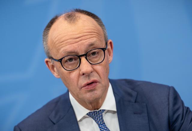 11 December 2025, Berlin: German Chancellor Friedrich Merz takes part in the press briefing on the results of the consultations following the coalition committee in the Chancellery. Photo: Michael Kappeler/dpa