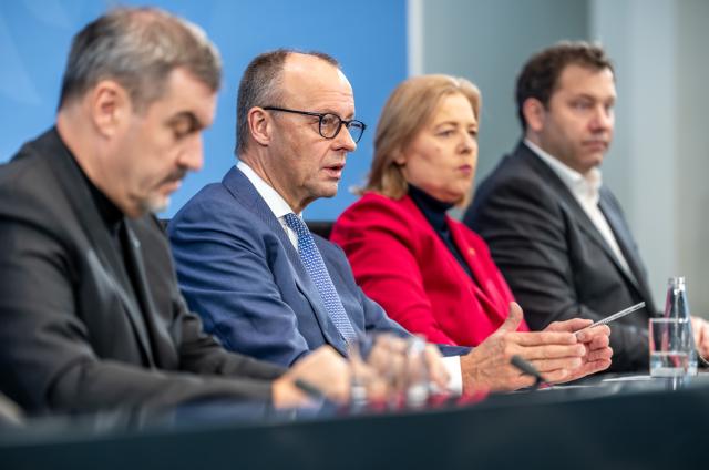 12 November 2025, Berlin: (L-R)Markus Soeder, Minister President of Bavaria and CSU Chairman, Friedrich Merz, German Chancellor, Baerbel Bas, German Minister of Labor and Social Affairs and Lars Klingbeil, German Minister of Finance attend the press briefing on the results of the consultations following the coalition committee in the Chancellery. Photo: Michael Kappeler/dpa