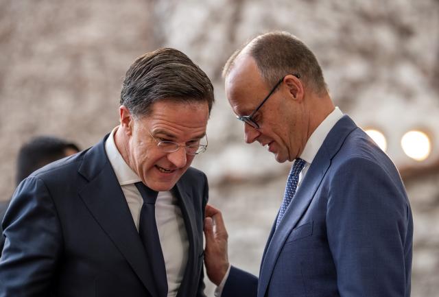 11 December 2025, Berlin: German Chancellor Friedrich Merz (R) speaks to Mark Rutte, NATO Secretary General, before a bilateral meeting at the Federal Chancellery. Photo: Michael Kappeler/dpa