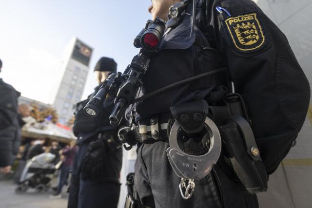 11 December 2025, Baden-Württemberg, Stuttgart: Police officers stand in Stuttgart city center, before the UEFA Europa League soccer match between VfB Stuttgart and Maccabi Tel Aviv at the MHPArena. Photo: Marijan Murat/dpa