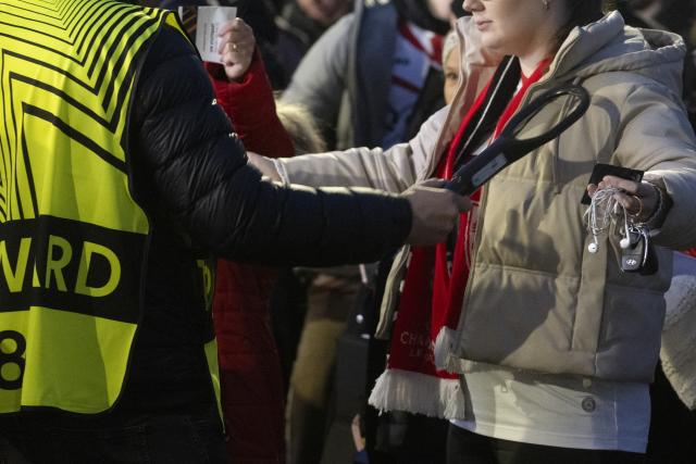 11 December 2025, Baden-Wuerttemberg, Stuttgart: Security officers check fans at the stadium entrance ahead of the UEFA Europa League soccer match between VfB Stuttgart and Maccabi Tel Aviv at MHPArena. Photo: Marijan Murat/dpa