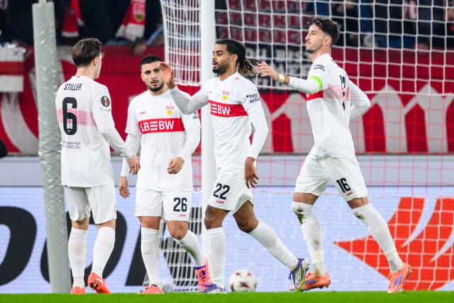 11 December 2025, Baden-Wuerttemberg, Stuttgart: Stuttgart's Lorenz Assignon (2nd R) celebrates after scoring his side's first goal of the game during the UEFA Europa League soccer match between VfB Stuttgart and Maccabi Tel Aviv at MHPArena. Photo: Tom Weller/dpa