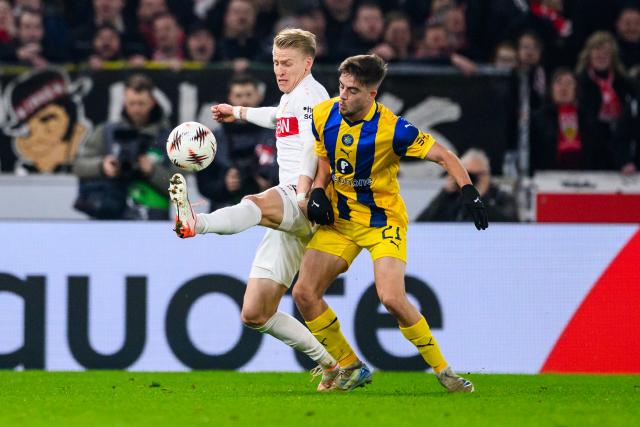 11 December 2025, Baden-Wuerttemberg, Stuttgart: Stuttgart's Chris Fuehrich and Maccabi Tel Aviv's Noam Ben Harush (R) battle for the ball during the UEFA Europa League soccer match between VfB Stuttgart and Maccabi Tel Aviv at MHPArena. Photo: Tom Weller/dpa