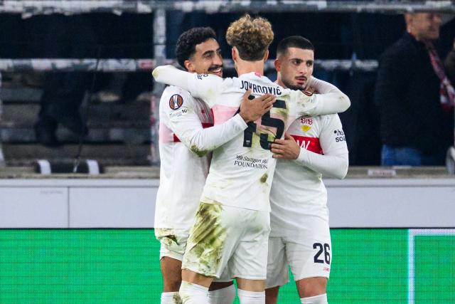 11 December 2025, Baden-Wuerttemberg, Stuttgart: (L-R) Stuttgart's Tiago Tomas,  Lazar Jovanovic and Deniz Undav celebrate after scoring their side's second goal of the game during the UEFA Europa League soccer match between VfB Stuttgart and Maccabi Tel Aviv at MHPArena. Photo: Tom Weller/dpa