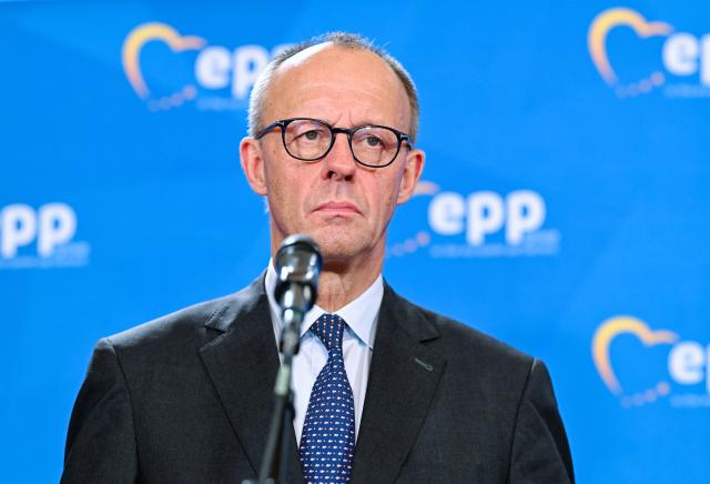 12 December 2025, Baden-Württemberg, Heidelberg: German Chancellor Friedrich Merz gives a press conference at the end of a meeting of the EPP Group in the European Parliament. Photo: Uwe Anspach/dpa