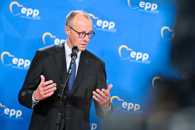 12 December 2025, Baden-Württemberg, Heidelberg: German Chancellor Friedrich Merz speaks at a press conference at the end of a meeting of the EPP Group in the European Parliament. Photo: Uwe Anspach/dpa