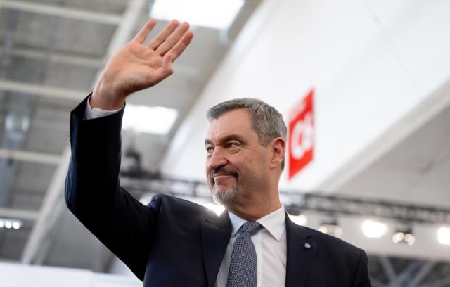 12 December 2025, Bavaria, Munich: Christian Social Union in Bavaria (CSU) Chairman and Minister President of Bavaria Markus Soeder arrives in the exhibition hall before the start of the CSU party conference. Photo: Sven Hoppe/dpa