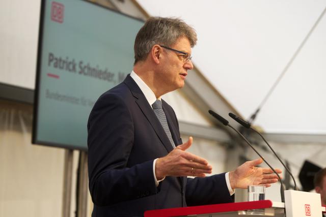 12 December 2025, Rhineland-Palatinate, Dernau: German Minister of Transport Patrick Schnieder speaks at the ceremonial opening of the Ahr Valley Railway. Photo: Thomas Frey/dpa