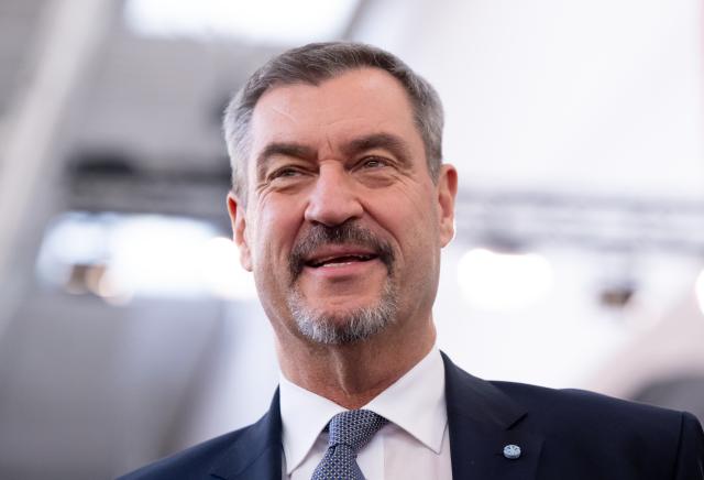 12 December 2025, Bavaria, Munich: Christian Social Union in Bavaria (CSU) Chairman and Minister President of Bavaria Markus Soeder arrives in the exhibition hall before the start of the CSU party conference. Photo: Sven Hoppe/dpa