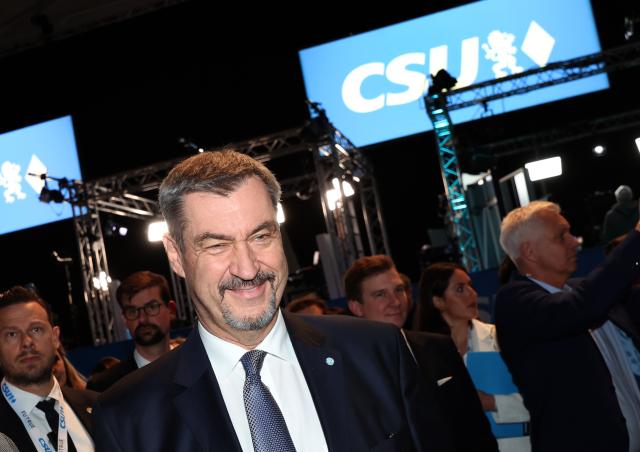 12 December 2025, Bavaria, Munich: Christian Social Union in Bavaria (CSU) Chairman and Minister President of Bavaria Markus Soeder arrives in the exhibition hall before the start of the CSU party conference. Photo: Karl-Josef Hildenbrand/dpa
