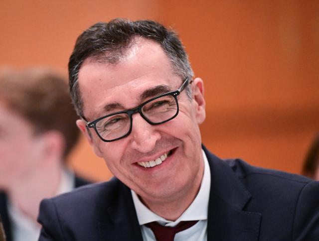 12 December 2025, Baden-Wuerttemberg, Ludwigsburg: Cem Oezdemir, Alliance 90/The Greens (Bündnis 90/Die Grünen) lead candidate for the 2026 state election in Baden-Wuerttemberg, sits in the front row at the start of the state party conference. Photo: Bernd Weißbrod/dpa