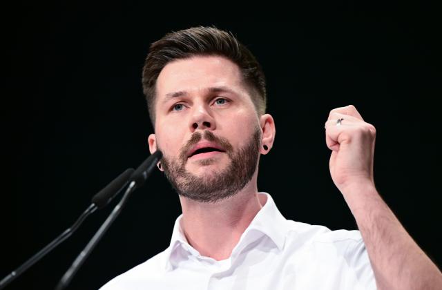 12 December 2025, Baden-Wuerttemberg, Ludwigsburg: Pascal Haggenmueller, the re-elected state executive committee member of the Alliance 90/The Greens (Bündnis 90/Die Grünen) Baden-Wuerttemberg party, speaks at the state party conference. Photo: Bernd Weißbrod/dpa