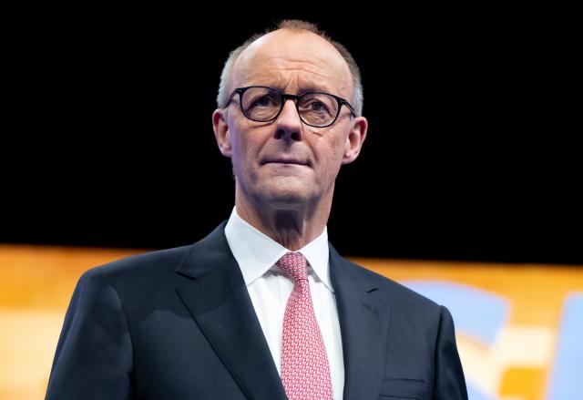13 December 2025, Bavaria, Munich: German Chancellor Friedrich Merz on stage at the CSU party conference in the exhibition hall. Photo: Sven Hoppe/dpa