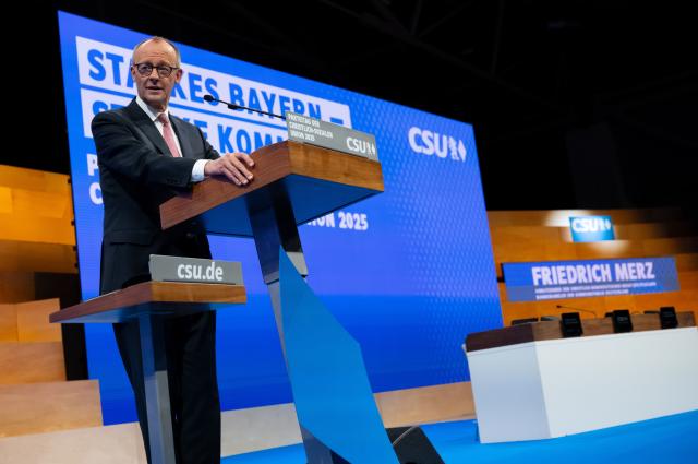 13 December 2025, Bavaria, Munich: German Chancellor Friedrich Merz speaks at the CSU party conference in the exhibition hall. Photo: Sven Hoppe/dpa