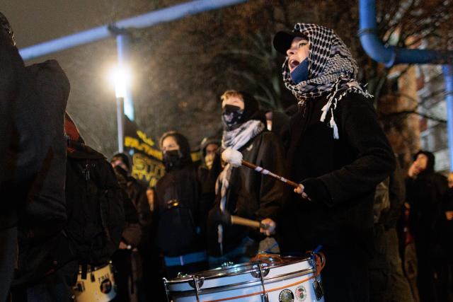 13 December 2025, Berlin: Left-wing groups members take part in a demonstration against the police under the slogan "War on the system - ACAB" in the Friedrichshain district. Photo: Carsten Koall/dpa