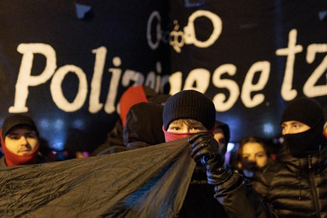 13 December 2025, Berlin: Left-wing groups members take part in a demonstration against the police under the slogan "War on the system - ACAB" in the Friedrichshain district. Photo: Carsten Koall/dpa