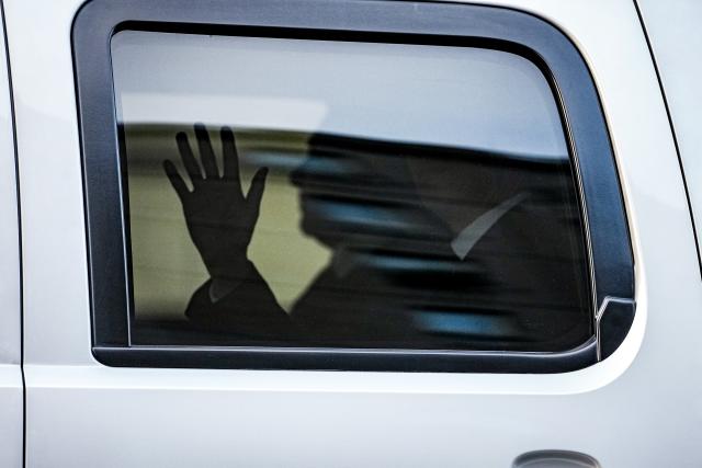 14 December 2025, Berlin: Jared Kushner, entrepreneur and former chief adviser to the US President, waves alongside Steve Witkoff, US Special Envoy, as they drive out of the garage of the Adlon Hotel. The US representatives are in Berlin to discuss a possible ceasefire with Ukrainian and European officials. Photo: Kay Nietfeld/dpa