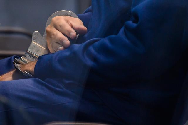 15 December 2025, Saxony-Anhalt, Magdeburg: Defendant Taleb al-Abdulmohsen sits handcuffed in a bulletproof glass box at Magdeburg District Court during the trial. The public prosecutor's office is accusing the man from Saudi Arabia of 338 counts of attempted murder. On December 20, 2024, Taleb al-Abdulmohsen drove into a crowd of people at Magdeburg's Christmas market, killing 6 and injuring more than 300 people. Photo: Klaus-Dietmar Gabbert/dpa