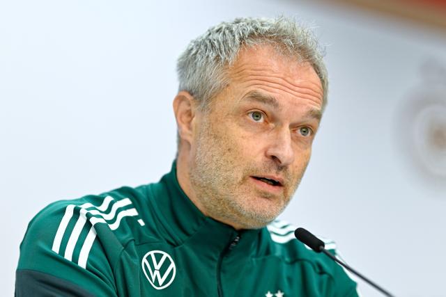 FILED - 27 November 2025, Rhineland-Palatinate, Kaiserslautern: German Women's National coach Christian Wueck speaks during the team's press conference ahead of the UEFA Women's Nations League first leg soccer match against Spain. Photo: Uwe Anspach/dpa