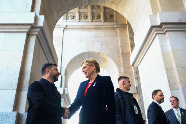 15 December 2025, Berlin: German Bundestag President, Julia Kloeckner, welcomes Ukrainian President Volodymyr Zelensky ahead of her talks at the German Bundestag, on the second day of the Ukraine talks in Berlin. Photo: Lisi Niesner/Reuters/Pool/dpa