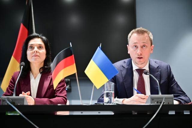 15 December 2025, Berlin: Oleksii Sobolev, Minister of Economy, Environment and Agriculture of Ukraine, speaks during the German-Ukrainian Economic Forum alongside Katherina Reiche, German Minister for Economic Affairs and Energy, on the sidelines of the consultations on the future of Ukraine in Berlin. Photo: Sebastian Gollnow/dpa