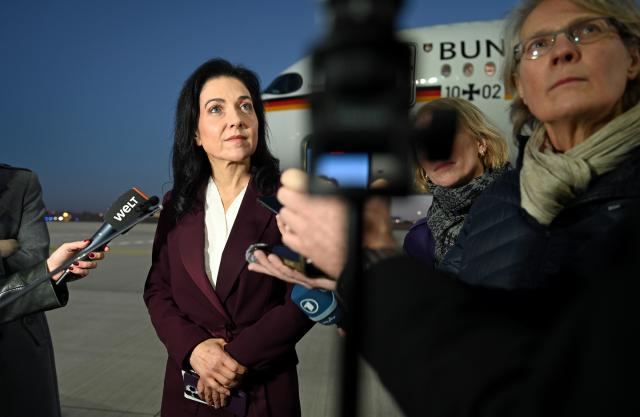 15 December 2025, Berlin: Katherina Reiche, Germany's Minister for Economic Affairs and Energy, makes a statement on the tarmac at Schoenefeld Airport before her departure to Israel. Photo: Elisa Schu/dpa