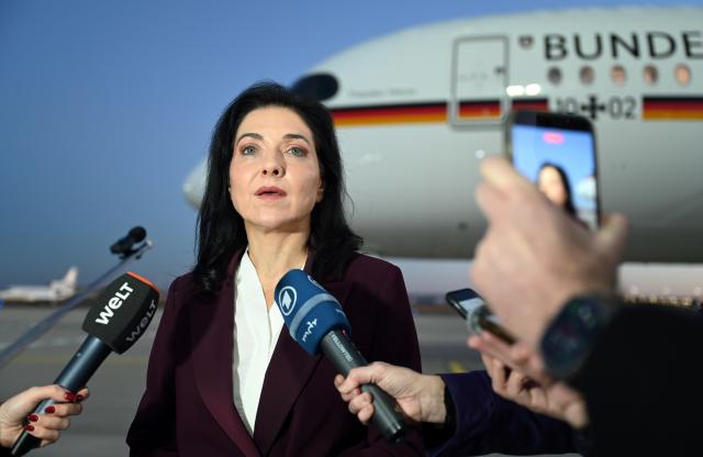 15 December 2025, Berlin: Katherina Reiche, Germany's Minister for Economic Affairs and Energy, makes a statement on the tarmac at Schoenefeld Airport before her departure to Israel. Photo: Elisa Schu/dpa