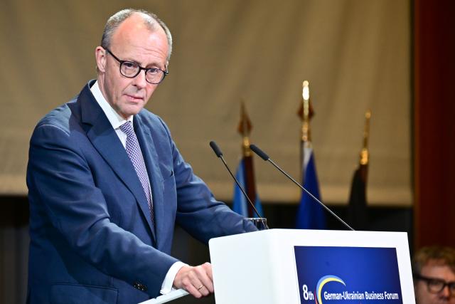 15 December 2025, Berlin: Germany's Chancellor Friedrich Merz speaks during the German-Ukrainian Business Forum. At the same time, the German government is hosting delegations from the United States and Ukraine for talks on a proposed peace plan, including a possible ceasefire in Ukraine. Photo: Sebastian Christoph Gollnow/dpa