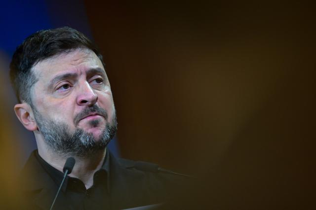 15 December 2025, Berlin: Ukrainian President Volodymyr Zelensky speaks during the German-Ukrainian Business Forum. At the same time, the German government is hosting delegations from the United States and Ukraine for talks on a proposed peace plan, including a possible ceasefire in Ukraine. Photo: Sebastian Christoph Gollnow/dpa