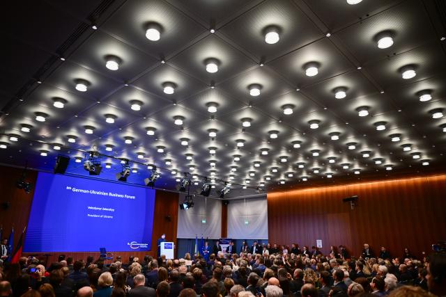 15 December 2025, Berlin: Ukrainian President Volodymyr Zelensky speaks during the German-Ukrainian Business Forum. At the same time, the German government is hosting delegations from the United States and Ukraine for talks on a proposed peace plan, including a possible ceasefire in Ukraine. Photo: Sebastian Christoph Gollnow/dpa