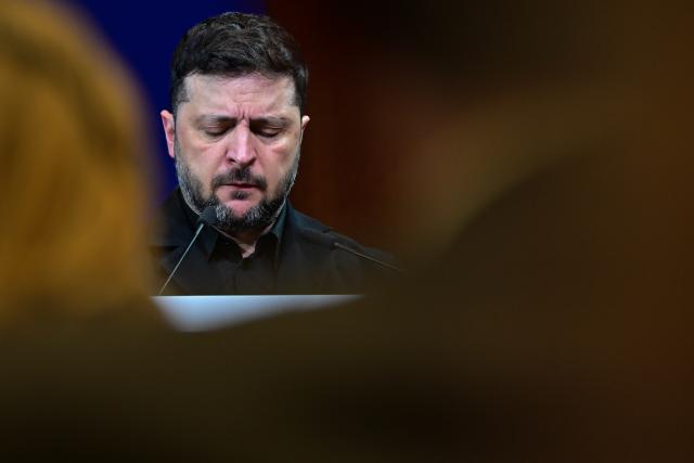 15 December 2025, Berlin: Ukrainian President Volodymyr Zelensky speaks during the German-Ukrainian Business Forum. At the same time, the German government is hosting delegations from the United States and Ukraine for talks on a proposed peace plan, including a possible ceasefire in Ukraine. Photo: Sebastian Christoph Gollnow/dpa