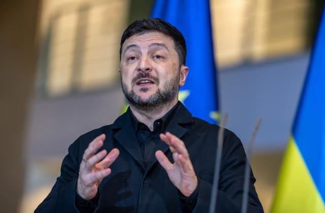 15 December 2025, Berlin: Ukrainian President Volodymyr Zelensky speaks during a joint press conference with Germany's Chancellor Friedrich Merz (not pictured) at the German Chancellery. Photo: Michael Kappeler/dpa