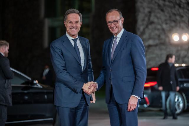 15 December 2025, Berlin: Germany's Chancellor Friedrich Merz (R) welcomes Mark Rutte, Secretary General of NATO, at the Chancellery. Consultations on a possible peace in Ukraine take place in Berlin. Photo: Michael Kappeler/dpa