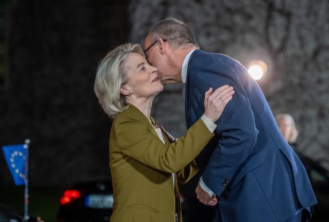 15 December 2025, Berlin: Germany's Chancellor Friedrich Merz (R) welcomes Ursula von der Leyen, President of the EU Commission, at the Chancellery. Consultations on a possible peace in Ukraine take place in Berlin. Photo: Michael Kappeler/dpa