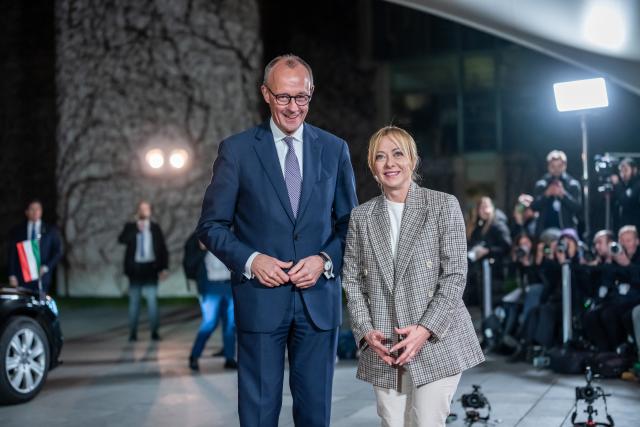 15 December 2025, Berlin: Germany's Chancellor Friedrich Merz (R) welcomes Italy's Prime Minister Giorgia Meloni at the Chancellery. Consultations on a possible peace plan in Ukraine are taking place in Berlin. Photo: Michael Kappeler/dpa
