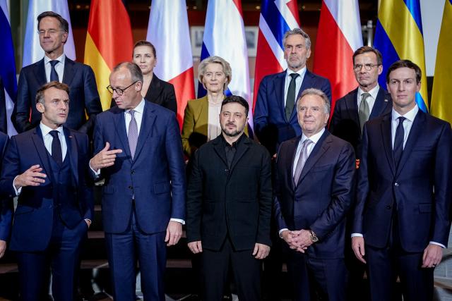 15 December 2025, Berlin: (L-R) French President Emmanuel Macron, German Chancellor Friedrich Merz, Ukrainian President Volodymyr Zelensky, Steve Witkoff, US Special Envoy, Jared Kushner, entrepreneur and former Chief Advisor to the US President, and (L-R) Mark Rutte, NATO Secretary General, Mette Frederiksen, Denmark's Prime Minister, Ursula von der Leyen, President of the European Commission, Dick Schoof, Prime Minister of the Netherlands, and Ulf Kristersson, Prime Minister of Sweden, stand together for a group photo at the beginning of the Ukraine summit in the German Chancellery. Discussions on a possible peace in Ukraine take place in Berlin. Photo: Kay Nietfeld/dpa-Pool/dpa