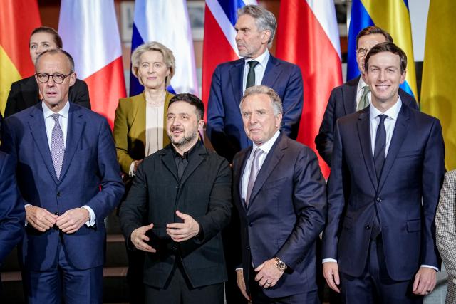 15 December 2025, Berlin: (Front L-R) Germany's Chancellor Friedrich Merz, Ukrainian President Volodymyr Zelensky, US Special Envoy Steve Witkoff, and Jared Kushner, entrepreneur and former Chief Advisor to the US President, pose for a group photo at the start of the Ukraine summit in the Federal Chancellery. Discussions on a possible peace in Ukraine are taking place in Berlin. Photo: Kay Nietfeld/dpa-Pool/dpa