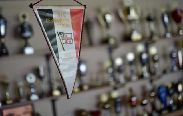 FILED - 09 April 2017, Berlin: A pennant of the football club BFC Germania 1888 hangs from the ceiling in Berlin. Photo: Britta Pedersen/dpa