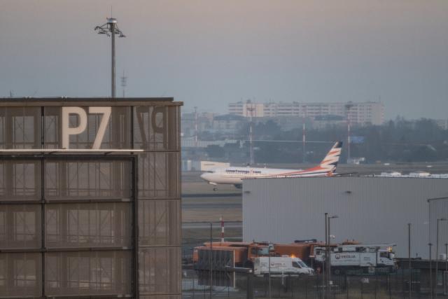 16 December 2025, Berlin: A Boeing 737 Max 8 with Afghans on board lands at Berlin Brandenburg Airport (BER). 160 Afghans have come to Berlin on a charter flight organized by the German government. Photo: Fabian Sommer/dpa