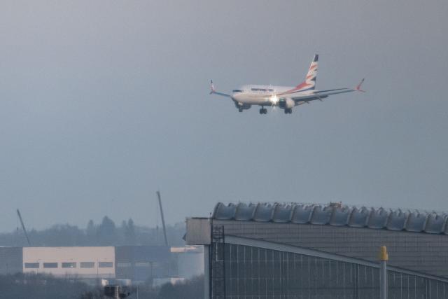 16 December 2025, Berlin: A Boeing 737 Max 8 with Afghans on board lands at Berlin Brandenburg Airport (BER). 160 Afghans have come to Berlin on a charter flight organized by the German government. Photo: Fabian Sommer/dpa