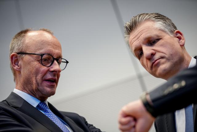 16 December 2025, Berlin: German Chancellor Friedrich Merz (L) and Thorsten Frei, Head of the Federal Chancellery and Federal Minister for Special Tasks, take part in the parliamentary group meeting of the CDU/CSU parliamentary group. Photo: Kay Nietfeld/dpa