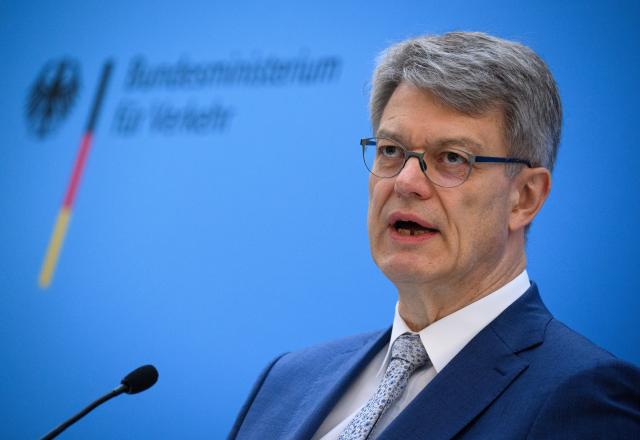 17 December 2025, Berlin: Patrick Schnieder, German Minister of Transport, speaks at a press conference after the cabinet meeting at the German Ministry of Transport on the Infrastructure Future Act. Photo: Bernd von Jutrczenka/dpa